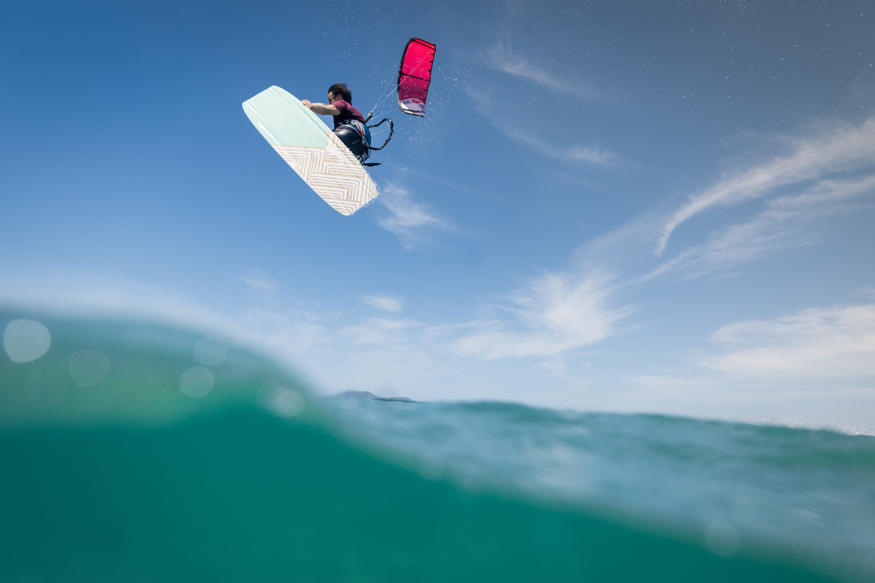 Action picture of the Xenon Hop 2024 twintip kiteboard board.