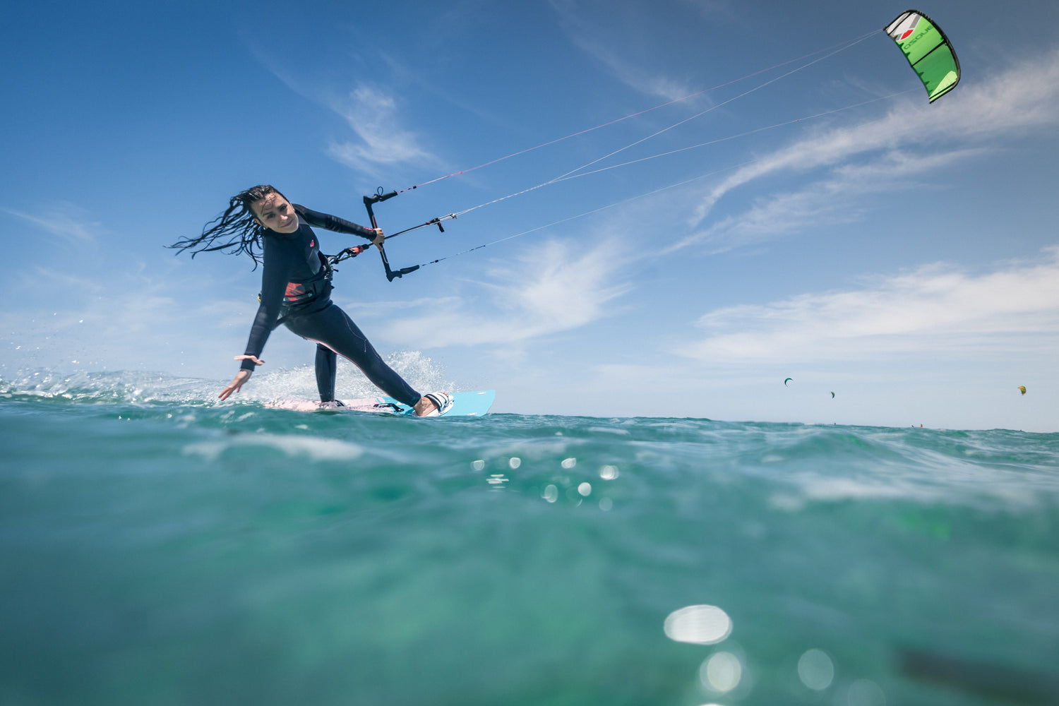 Action picture of the Xenon Women 2024 twintip kiteboard.