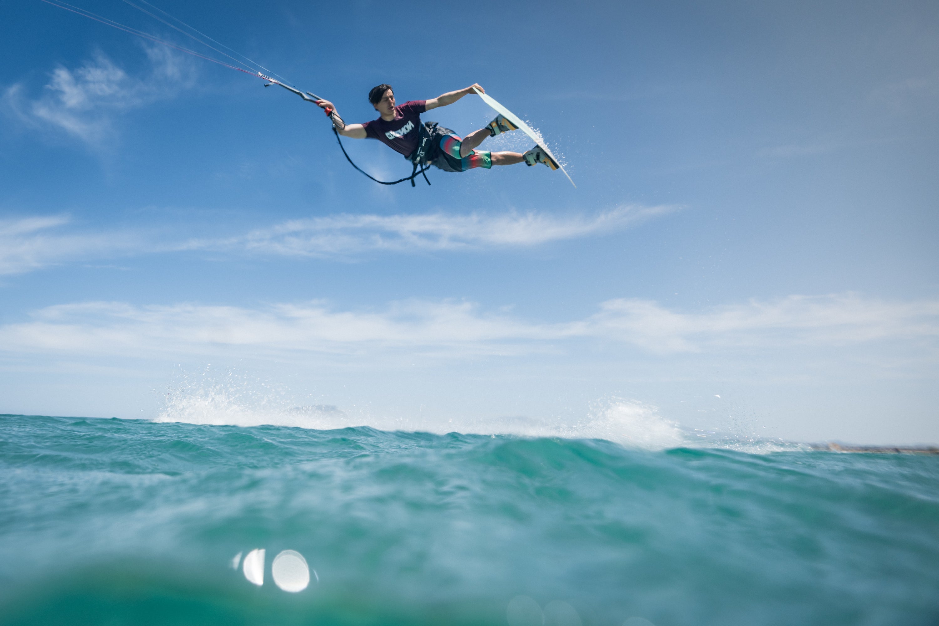 Action picture of the Xenon Hop 2024 twintip kiteboard board.