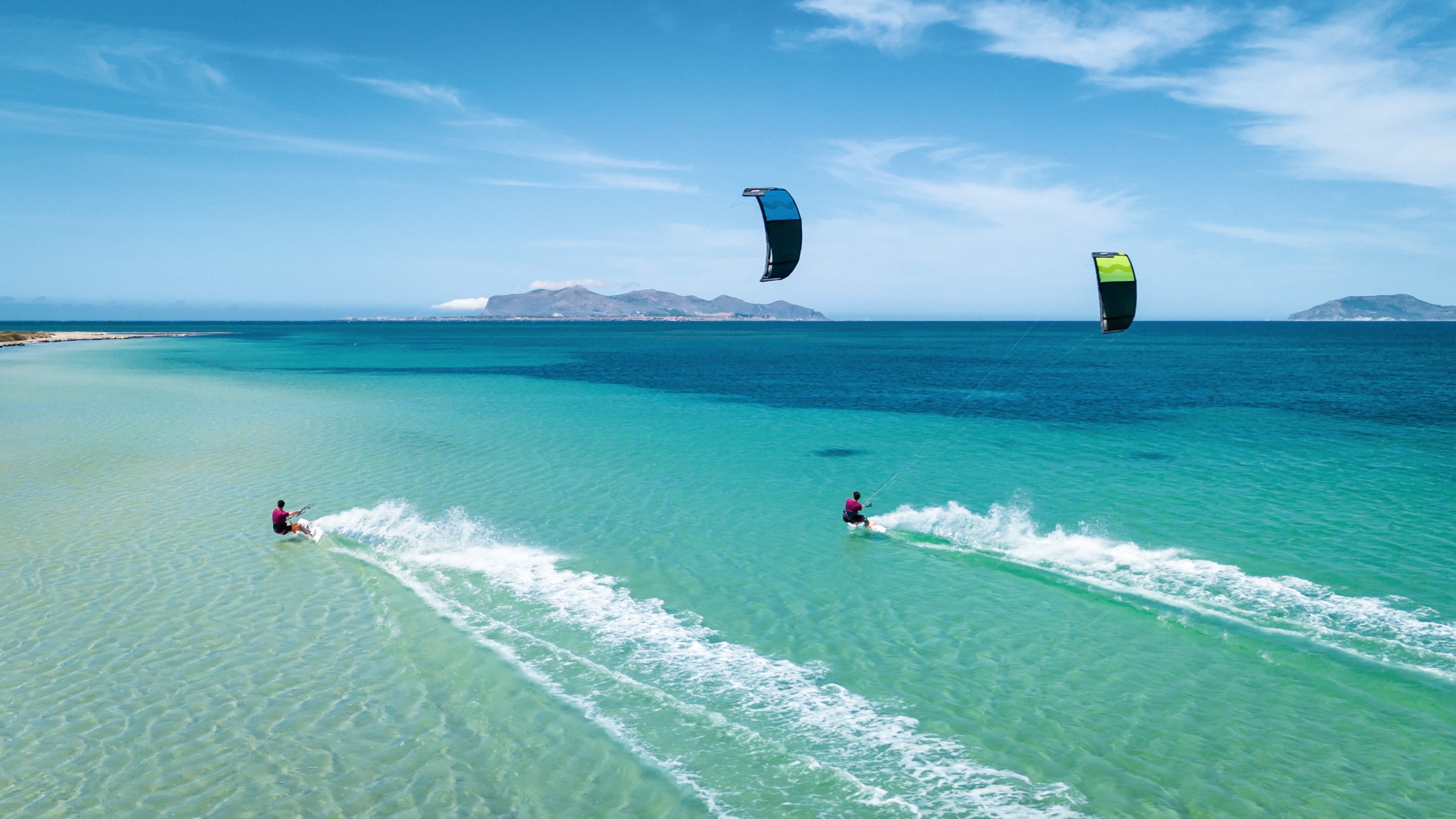 Load video: Video of Xenon team riders kitesurfing in Sicily with their new 2024 Xenon twin tip boards.